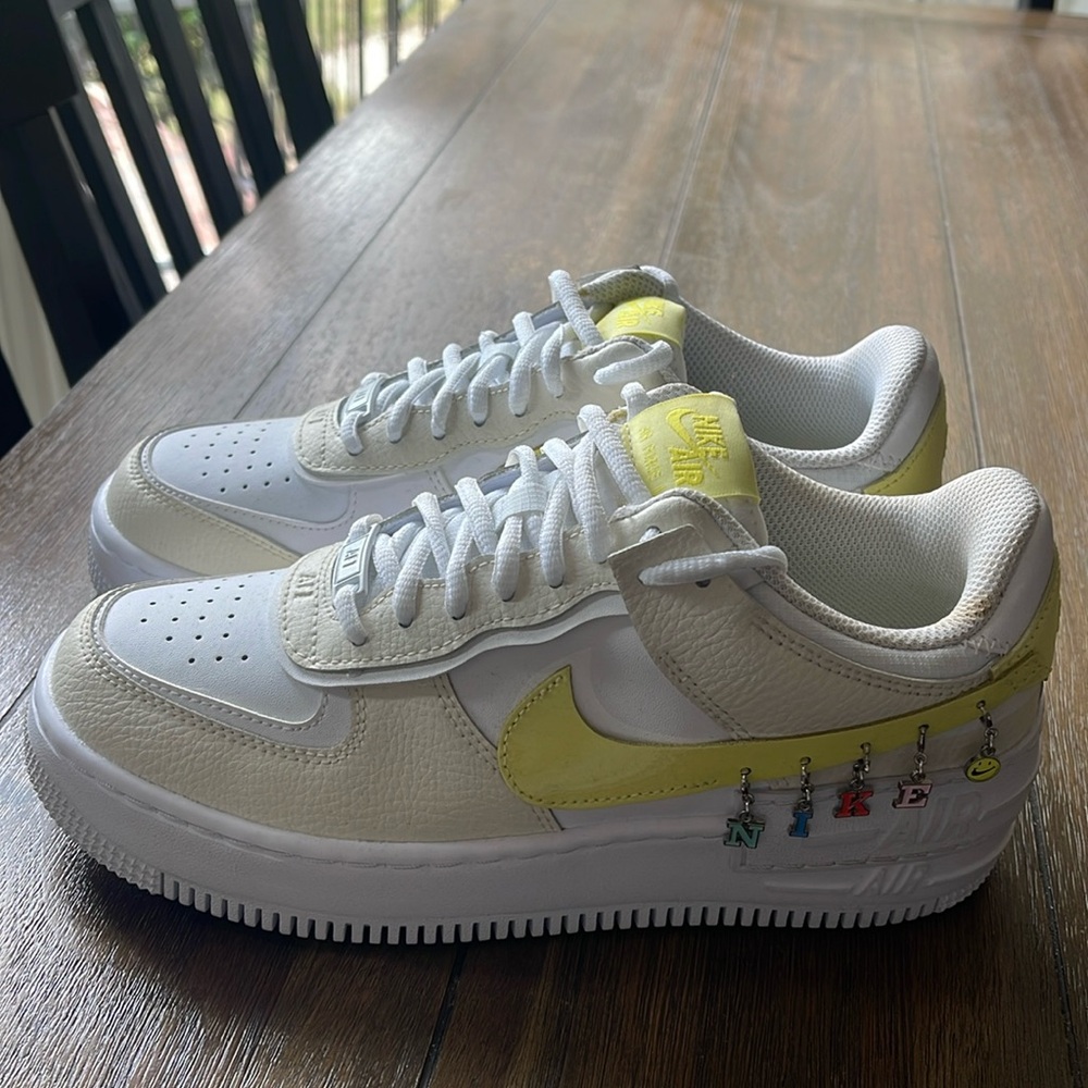 EUC … worn once!  Size 8 women’s NIKE Air Force 1 charm sneakers